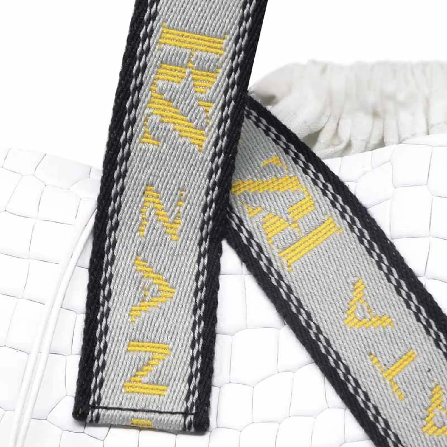 California white bag with text straps